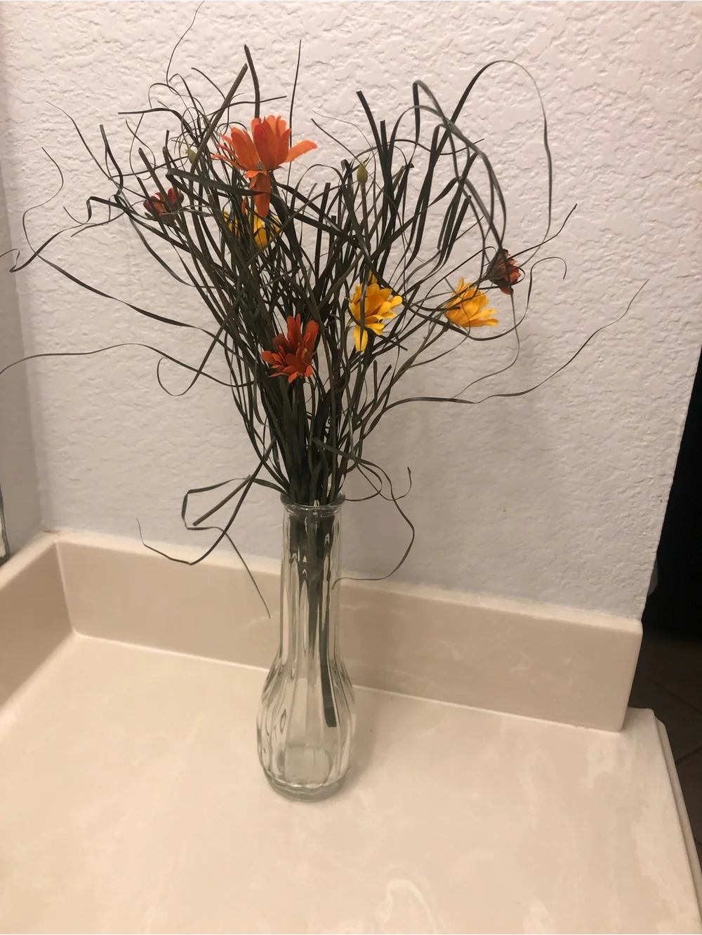 Decorative Orange and Yellow Artificial Flower Bouquet in Clear Glass Vase
